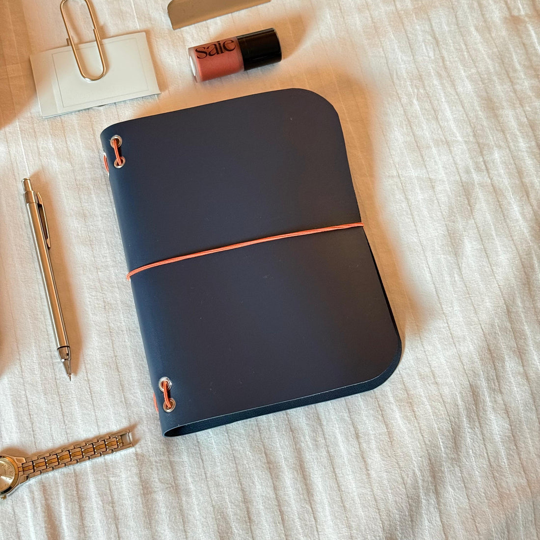 Open navy handmade journal flat lay for journaling prompts — Arc and Axis UAE
