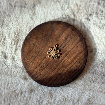 Decorative charm for Arc and Axis Trifold journal