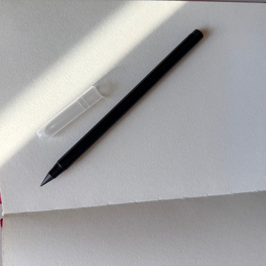 Inkless metal-alloy tip of the Arc and Axis Infinity Pencil close up